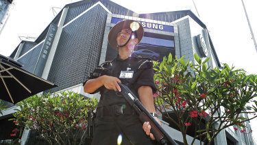 A Gurkha police officer stands guard outside the venue of the IMF-World Bank meetings in Singapore, a possible site for the Trump-Kim summit on June 12.  