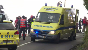 Emergency services attend the scene after a tour bus crashed at Canico on Portugal's Madeira Island.
