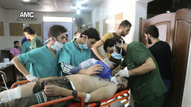 A man is treated by Syrian medical staff after a chemical weapons attack in 2016.