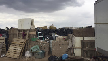 This photo released by Taos County Sheriff's Office shows the rural compound in which they found 11 children in filthy conditions.