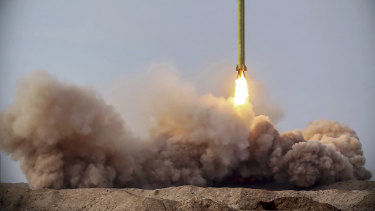 A ballistic missile is launched in a drill in Iran. 