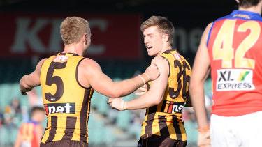 Dylan Moore celebrates a Hawthorn goal in style with James Worpel.