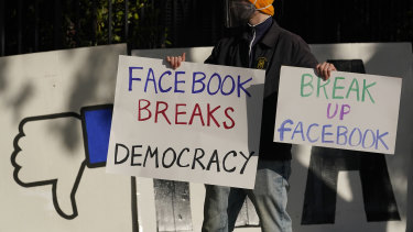 Backlash against Facebook: A demonstrator outside of the home of Facebook CEO Mark Zuckerberg in November.
