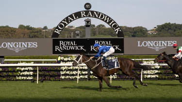 Snapshot: Winx crosses for her 33rd straight victory.
