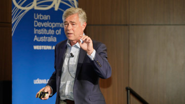 Economist and political analyst Jonathan Pain speaks at Crown Perth.