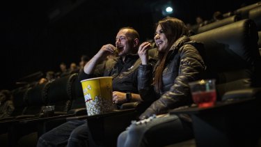 Ekrem Karakos and Alev Babayigit enjoy a move in cinemas on Friday. 
