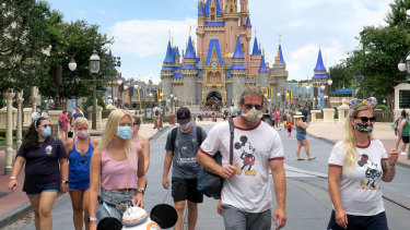 Masks for all. The Magic Kingdom at Walt Disney World in Florida opened its doors again at the weekend, despite a surging caseload in the state.