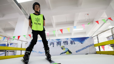 Workers test the ski simulator at the Zhangjiakou Ice and Snow Sports Equipment Park in Zhangjiakou, China. 
