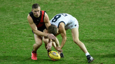 Callan Ward was accused of staging after being awarded a free kick for this incident with Essendon's Shaun McKernan.