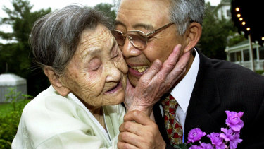September 2000: Former North Korean spy Shin In-young, right, embraces his mother Ko Pong-hee in Seoul before departing for North Korea as part of an exchange deal.