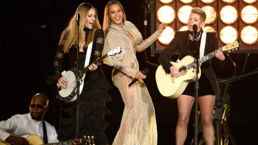 Beyonce wearing a gown by J'Aton at the 2016 Country Music Awards.