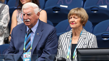Margaret Court and her husband take in the tennis on day one of the Open.
