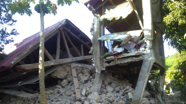 A damaged house in Itbayat town, Batanes islands, northern Philippines after a strong earthquake struck on Saturday.