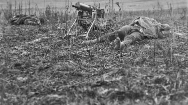 Men lie dead at Montbrehain, scene of the last battle involving Australian infantry on the Western Front.