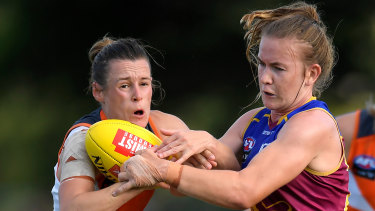 Alicia Eva of the Giants (left) and Shannon Campbell of the Lions compete for the ball.