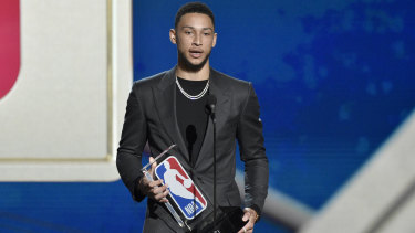 Ben Simmons, of the Philadelphia 76ers, accepts the Rookie of the Year Award in June.