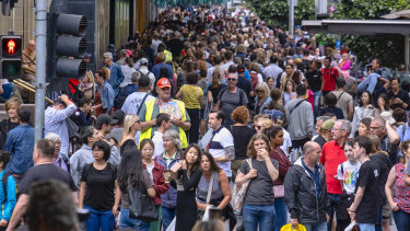 A very different picture: Shoppers pictured in Melbourne's CBD during last year's Christmas shopping rush.
