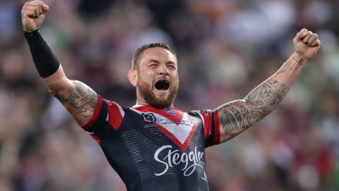The NRL is making plans around the restructuring of the grand final. Jared Waerea-Hargreaves of the Roosters celebrates last year's triumph.