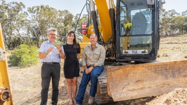 Royal Canberra Show chief executive Athol Chalmers launches the 'Dueling Excavators' competition with sponsors Yukari and Lee Carmody, of Drive This Canberra. The competition is part of a new-look main arena program at this year's Show.