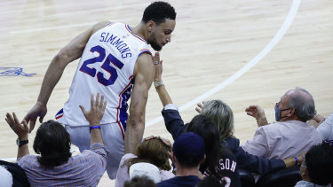Ben Simmons inadvertently bumps into fans seated courtside during the fourth quarter of game seven of the eastern conference semi-finals against the young Atlanta Hawks.