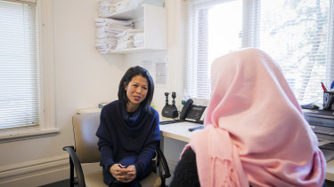 Tram Nguyen, the medical director and psychiatrist at Cabrini Asylum Seeker and Refugee Health Hub in Brunswick, speaks with a patient. 