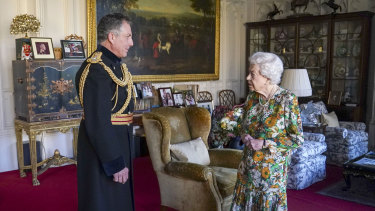 Queen Elizabeth II receives General Sir Nick Carter, Chief of the Defence Staff, left, during an audience in the Oak Room at Windsor Castle, Berkshire.