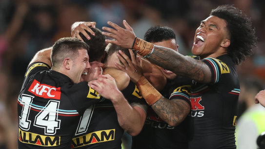Penrith players celebrate Nathan Cleary’s match-winning try on Sunday night.