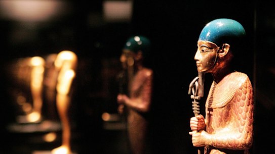  statue of Ptah, chief god of Memphis, recovered from the tomb of Egypt's King Tutankhamun is displayed at the Field Museum May 25, 2006 in Chicago, Illinois. The King Tut exhibit, which opens to the public tomorrow, is on loan from Egypt, part of a four-stop U.S. tour.  (Photo by Scott Olson/Getty Images) .