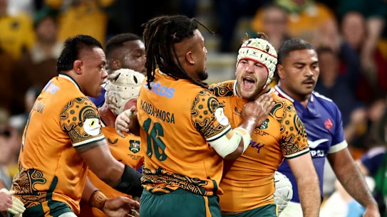 Fraser McReight celebrates a try.