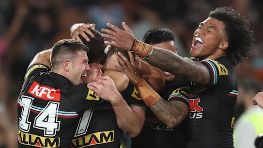 Penrith players celebrate Nathan Cleary’s match-winning try on Sunday night.