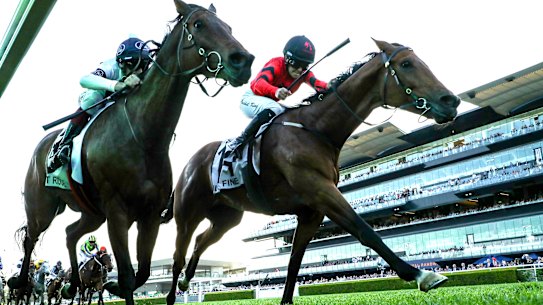 Rachel King on Just Fine holds off Spirit Ridge in the Metropolitan at Randwick.