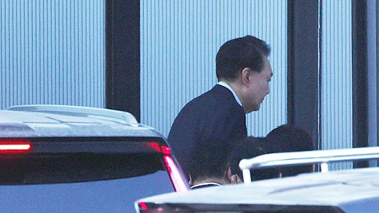 Impeached South Korean President Yoon Suk Yeol arrives at the Corruption Investigation Office for High-ranking Officials in Gwacheon.
