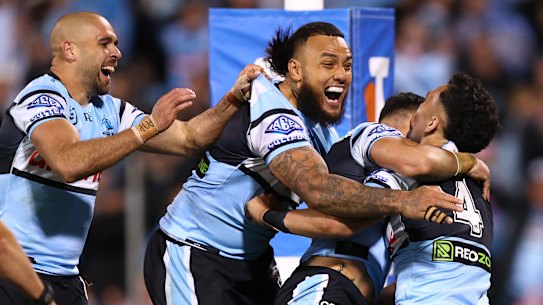 Oh we’re the real deal, baby. Cronulla celebrate a try against Canberra.