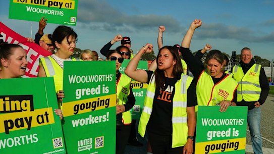Protesters formed a picket line outside the Woolworths distribution centre in Dandenong South on Monday.