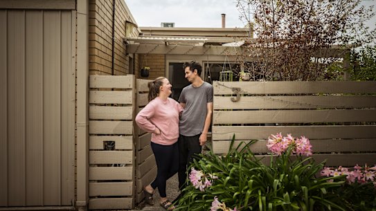 Rebecca and Jordan Smith outside their three bedroom townhouse in Ringwood East.