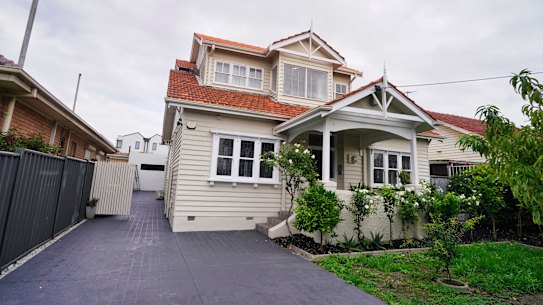 The weatherboard and stained-glass home had five bedrooms and a separate bungalow.