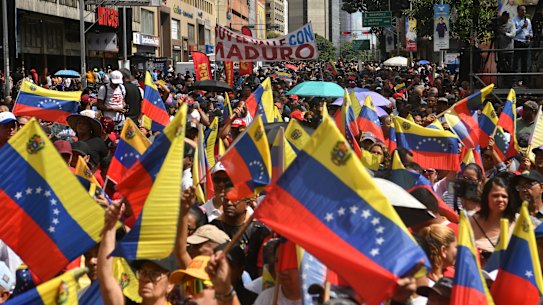 Pro-government supporters attend a rally a day after the capture of Nicolas Maduro.