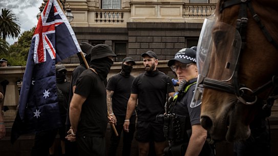 Neo-Nazis, led by Thomas Sewell, marched on Spring Street on Saturday.