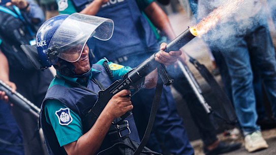 Police fire tear gas shells to disperse students in Dhaka, Bangladesh.