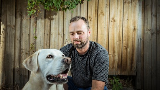 Brunswick dog owner Robert Lechte, a co-founder of the Merri-bek Pet Registration Justice Committee group with his golden labrador Astro.