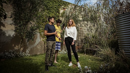 Elisa Hill, husband Philippe Yardin and son Jai, who lives with severe autism.