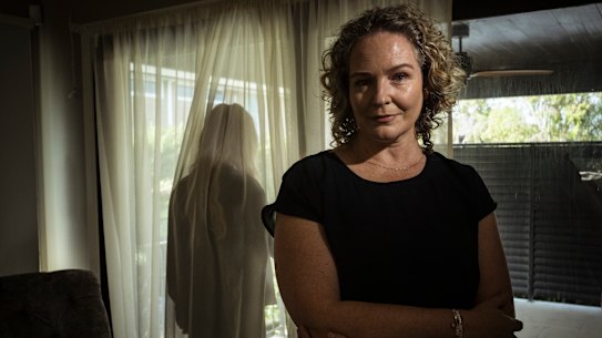 Financial advisor Julie Dal Pra sectured pro bono help from 78 people to free Christine (in background) from her ex-husband’s fraudulent directorships, loans and tax debt in her name totalling $9.5 million.