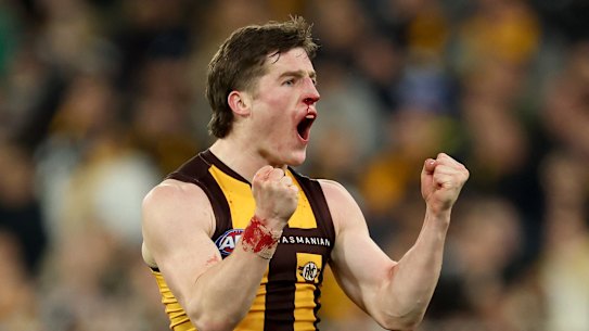 Josh Ward celebrates a goal against the Blues.