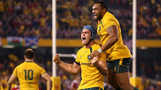 Then-captain James Horwill and Sekope Kepu show what a Lions tour means in celebrating their win in the second Test in 2013.