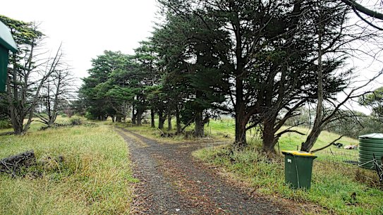 The property currently has an abandoned farmhouse and stables.