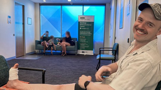 Angus Thomson in the waiting room of an urgent care clinic. 2025 