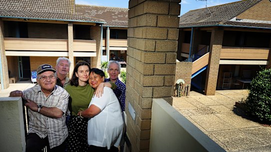 Photos of Techno Park Drive residents,  Arnie Hindhaugh, Matt Robinson (blue shirt), Nida and Vincent Schirripa  (small couple) and Lara Week (green top) in Williamstown on Friday 16 February 2024. 