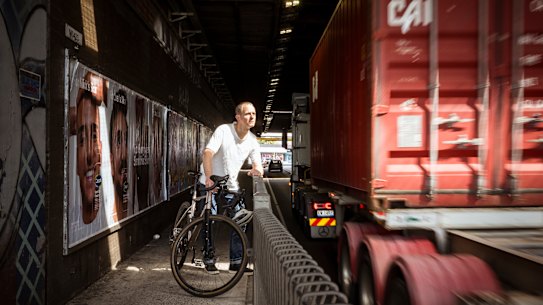 John Symons, president of the cycling advocacy group BikeWest, at the northern edge of the Ashley Road railway underpass.