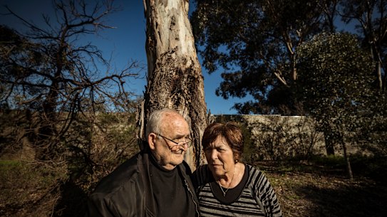 Les and Vicki Kermanidis in parkland  across the road from their Bulleen home of 46 years. It is among six hectares of open space to go, to widen the Eastern Freeway.