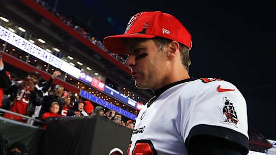 Tom Brady leaves the field after the loss to the Rams.